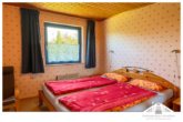 Schlafzimmer - Ostseenah – Energieeffiziente Familienheim in landschaftlich reizvoller Lage zu verkaufen