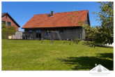 Hausansicht vom Garten aus - Ostseenah – Energieeffiziente Familienheim in landschaftlich reizvoller Lage zu verkaufen