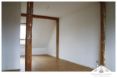 Wohnzimmer links - Dachgeschosswohnung in zentraler Wohnlage von Bad Kleinen zu vermieten