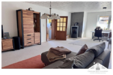 Wohnzimmer - Hübsches Eigenheim mit geräumiger Einliegerwohnung in ruhiger Lage zu verkaufen